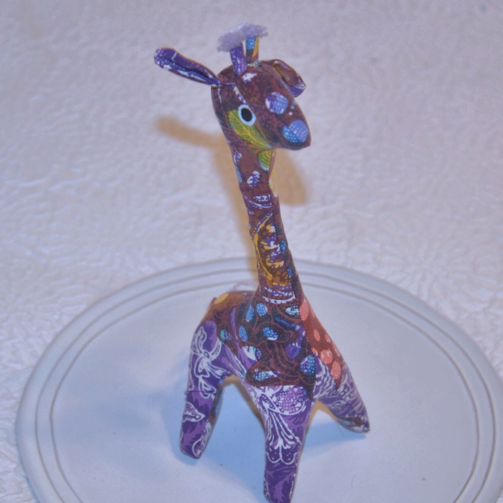 8/$20 Purple Giraffe Plush
